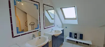 Salle de bains dans l'établissement La Villa du Manoir