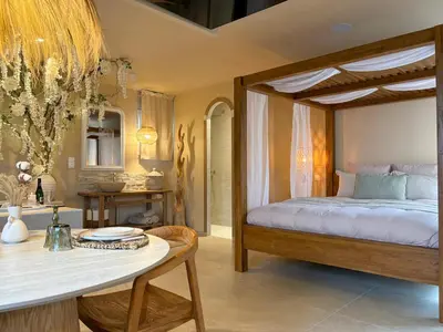 Un ou plusieurs lits dans un hébergement de l'établissement Baldamour Cocon romantique et spa Proche Caen