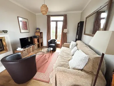 Coin salon dans l'établissement Maison avec jardin dans le centre de Cabourg