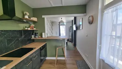 Cuisine ou kitchenette dans l'établissement L'Espadon