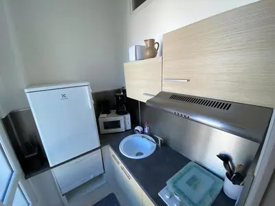 Cuisine ou kitchenette dans l'établissement Studio lumineux Cabourg plage & commerces à pied