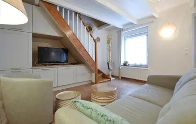 Coin salon dans l'établissement Maison Proche Port Et Plage