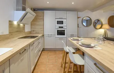 Cuisine ou kitchenette dans l'établissement Maison Proche Port Et Plage