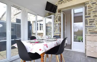 Télévision ou salle de divertissement dans l'établissement Maison Proche Littoral