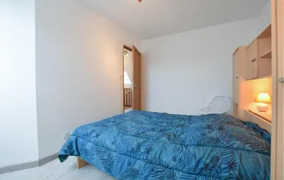 Un ou plusieurs lits dans un hébergement de l'établissement Maison Proche Littoral