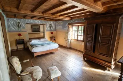 Un ou plusieurs lits dans un hébergement de l'établissement Séjournez au Manoir de Damigny en Normandie