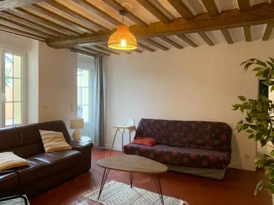 Coin salon dans l'établissement L'escalier rouge - Maison typique avec cour