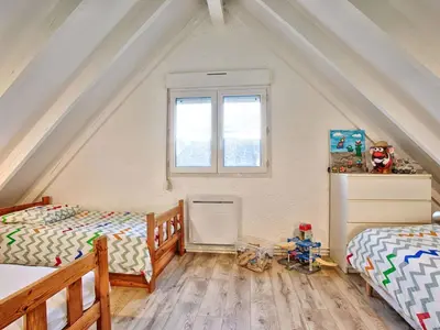 Un ou plusieurs lits dans un hébergement de l'établissement Maison familiale lumineuse près de la mer - FR-1-788-99