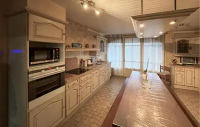 Cuisine ou kitchenette dans l'établissement Gîte Gouvile