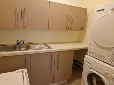 Cuisine ou kitchenette dans l'établissement Appartement 2 Chambres - Bord de mer - Wi-Fi