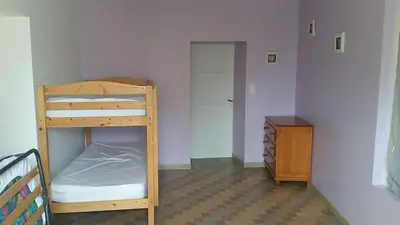 Un ou plusieurs lits dans un hébergement de l'établissement Maison au cœur des plages du débarquement
