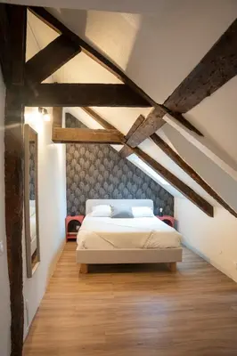 Un ou plusieurs lits dans un hébergement de l'établissement Duplex de charme dans le quartier du Vaugueux