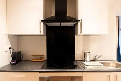 Cuisine ou kitchenette dans l'établissement Duplex de charme dans le quartier du Vaugueux