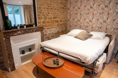 Un ou plusieurs lits dans un hébergement de l'établissement Duplex de charme dans le quartier du Vaugueux
