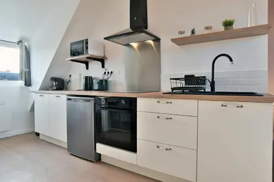 Cuisine ou kitchenette dans l'établissement Les Trois Rois 6 - Centre Avranches