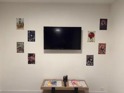 Télévision ou salle de divertissement dans l'établissement Appartement familial Disney proche de la mer