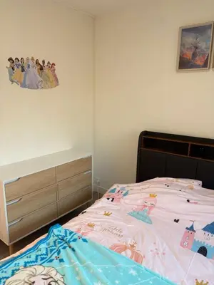 Un ou plusieurs lits dans un hébergement de l'établissement Appartement familial Disney proche de la mer