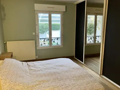 Un ou plusieurs lits dans un hébergement de l'établissement La Pause Normande - Bed & Breakfast