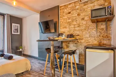 Cuisine ou kitchenette dans l'établissement L'Héritage - Hypercentre - Bars & Restaurants à pieds