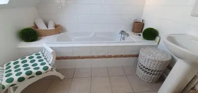 Salle de bains dans l'établissement Maison des Hortensias