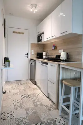 Cuisine ou kitchenette dans l'établissement Cabourg Bord de Mer