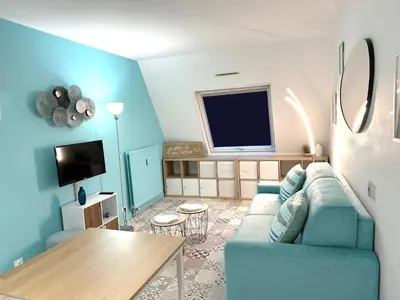 Télévision ou salle de divertissement dans l'établissement Cabourg Bord de Mer