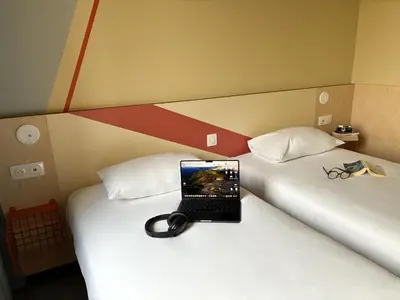 Un ou plusieurs lits dans un hébergement de l'établissement Ibis Budget Pontorson Baie Du Mont Saint Michel