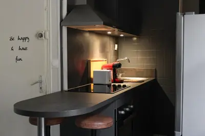 Cuisine ou kitchenette dans l'établissement Le Duplex appartement proche de la Cathédrale