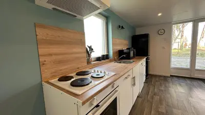 Cuisine ou kitchenette dans l'établissement Gîte 5places LE PRE SALE avec jardin proche mont saint michel