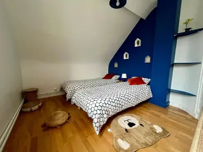 Un ou plusieurs lits dans un hébergement de l'établissement La Mésangère-Maison Normande à 150m de la Plage