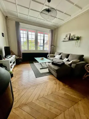 Coin salon dans l'établissement La Mésangère-Maison Normande à 150m de la Plage