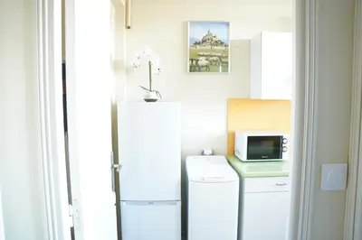 Cuisine ou kitchenette dans l'établissement Studio Lumineux Caen - Proche Gare & D-Day