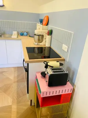 Cuisine ou kitchenette dans l'établissement La Capucine
