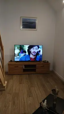 Télévision ou salle de divertissement dans l'établissement Gite du marais