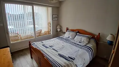 Un ou plusieurs lits dans un hébergement de l'établissement vue mer et plage Courseulles