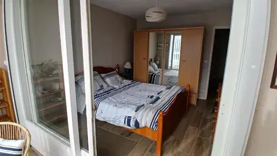 Un ou plusieurs lits dans un hébergement de l'établissement vue mer et plage Courseulles