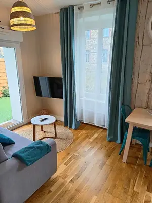 Télévision ou salle de divertissement dans l'établissement Studio TERRASSE