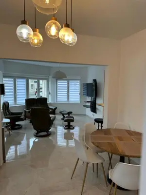 Télévision ou salle de divertissement dans l'établissement Villa Art Déco