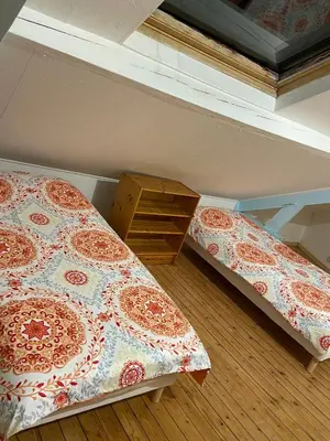 Un ou plusieurs lits dans un hébergement de l'établissement Villa Art Déco