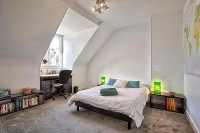 Un ou plusieurs lits dans un hébergement de l'établissement Le Cocon Urbain - Hypercentre - Duplex lumineux