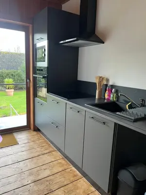 Cuisine ou kitchenette dans l'établissement Ô Chalet Normand