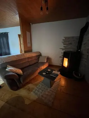 Coin salon dans l'établissement Ô Chalet Normand
