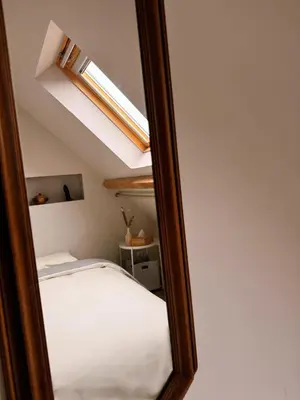 Un ou plusieurs lits dans un hébergement de l'établissement Charmante maison moderne et cosy