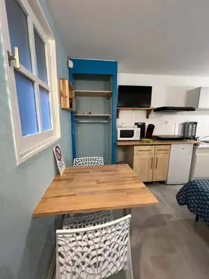 Cuisine ou kitchenette dans l'établissement Studio 9 en centre ville