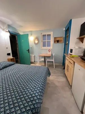 Cuisine ou kitchenette dans l'établissement Studio 9 en centre ville