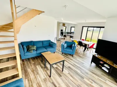 Télévision ou salle de divertissement dans l'établissement Holiday Home Maison de vacances Strandhaus by Interhome