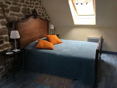 Un ou plusieurs lits dans un hébergement de l'établissement Holiday Home Gemütliches Haus in der Bucht von Mont-Saint-Michel by Interhome