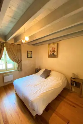 Un ou plusieurs lits dans un hébergement de l'établissement Holiday Home Le domaine des roseraies- gîte les roseraies by Interhome