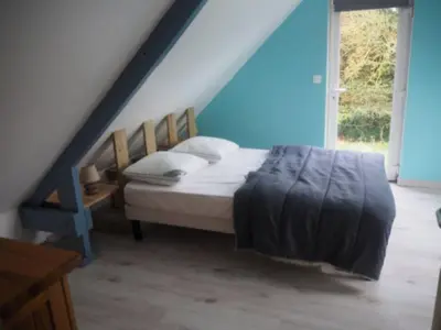 Un ou plusieurs lits dans un hébergement de l'établissement Holiday Home Le Bois aux Ecureuils - Eichhörnchenwald by Interhome