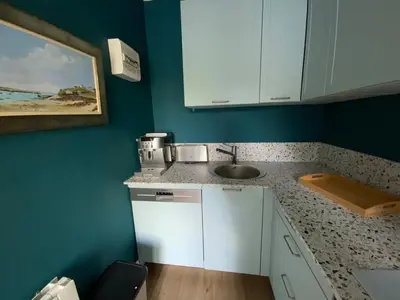 Cuisine ou kitchenette dans l'établissement Gîte 50 rue de la mer